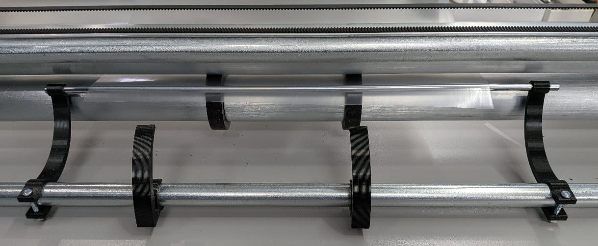 Custom polymer blade support attachment for cutting thin elastomer film on Krexil roll cutter